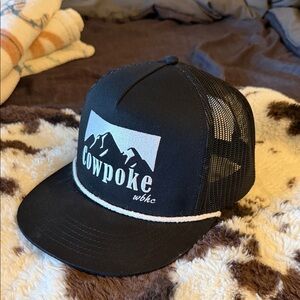 Cowpoke Trucker Hat in Black with White Logo